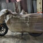 Motorcycle protected with packing materials for transport